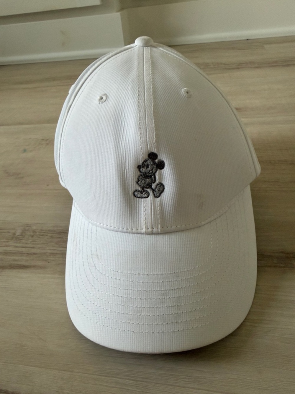 Nike White Baseball Cap with Small Black Embroidered Character